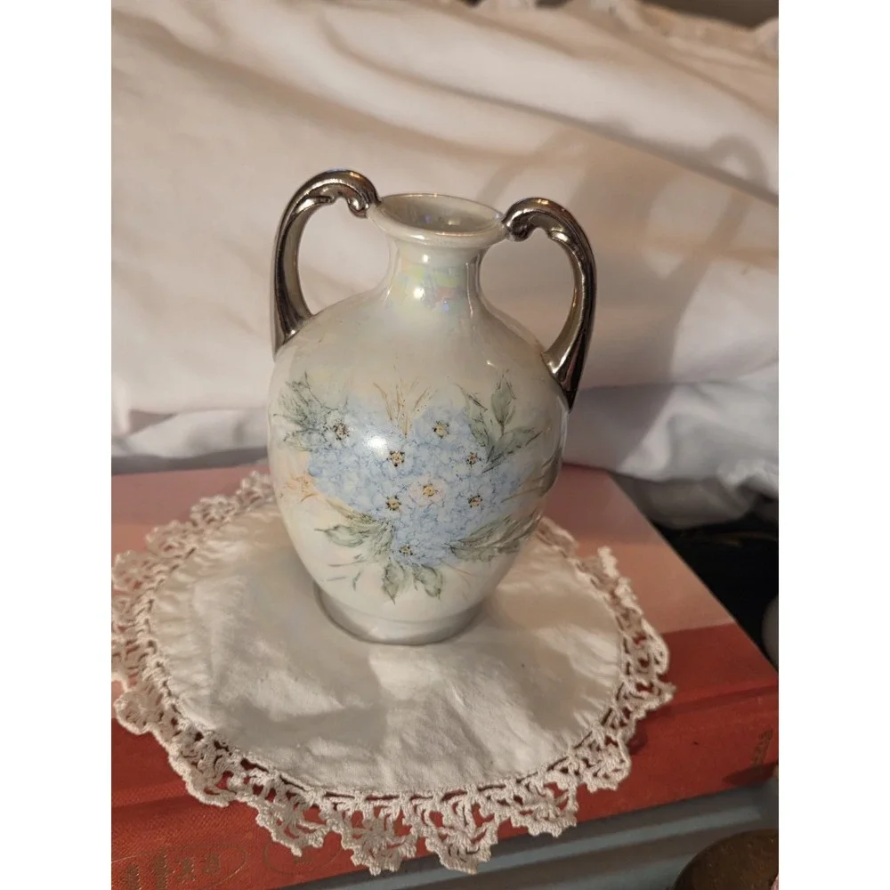 Vintage hand-painted porcelain or ceramic bud vase featuring an iridescent,...